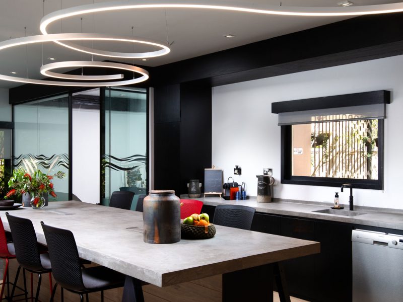 Kitchen and dining space designed by Dan Design, home Design Specialists Abu Dhabi